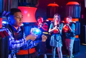 Kids playing Laser Tag and enjoying extended hours at iPlay America.